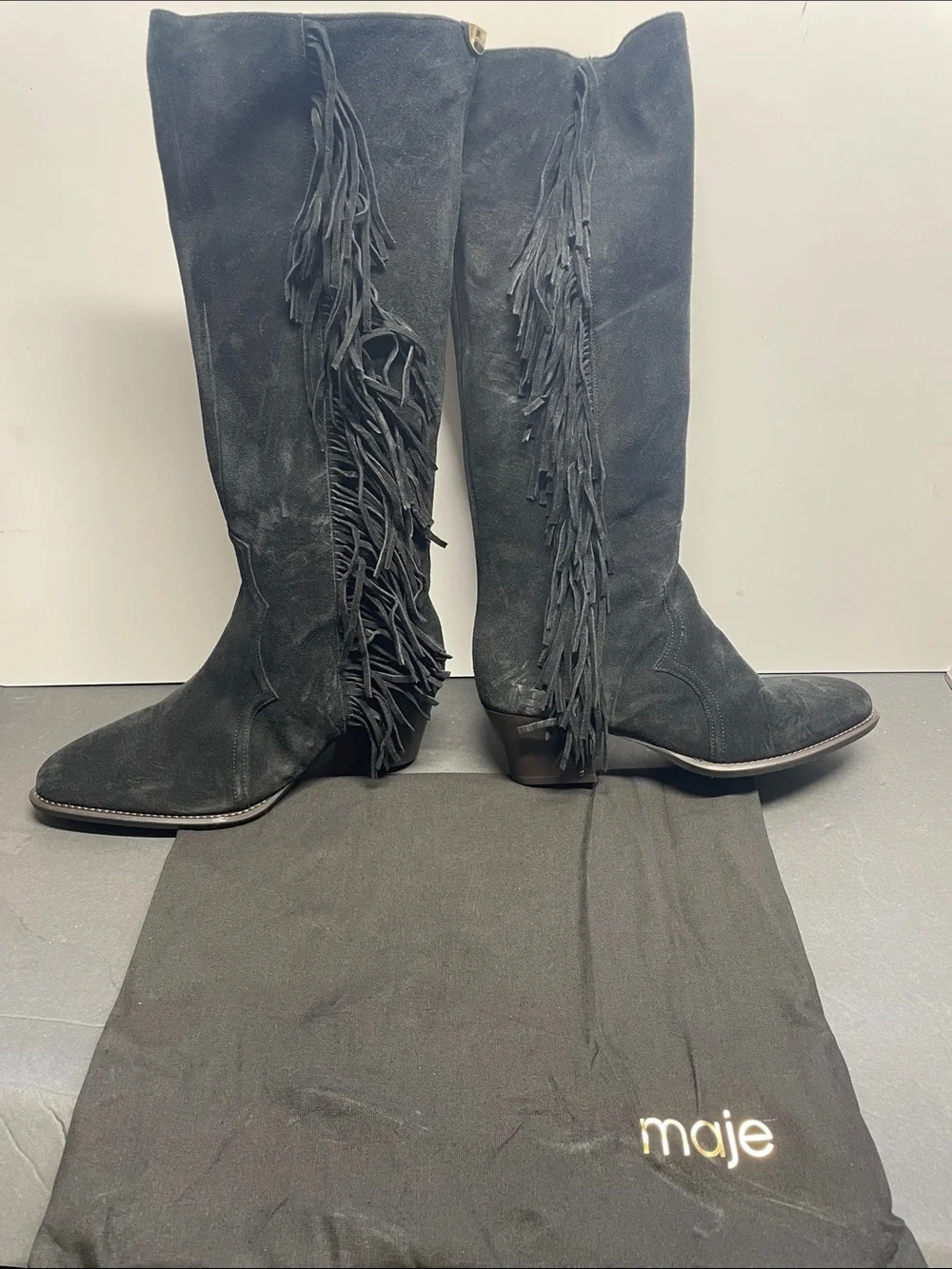 Fringed suede cowboy boots